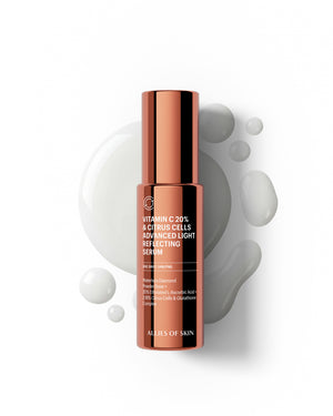 A bottle of Alls of Skin Vitamin C 20% & Citrus Cells Advanced Light Reflecting Serum, featuring a metallic copper-colored cap and label, set against a white background with abstract gray liquid droplets.
